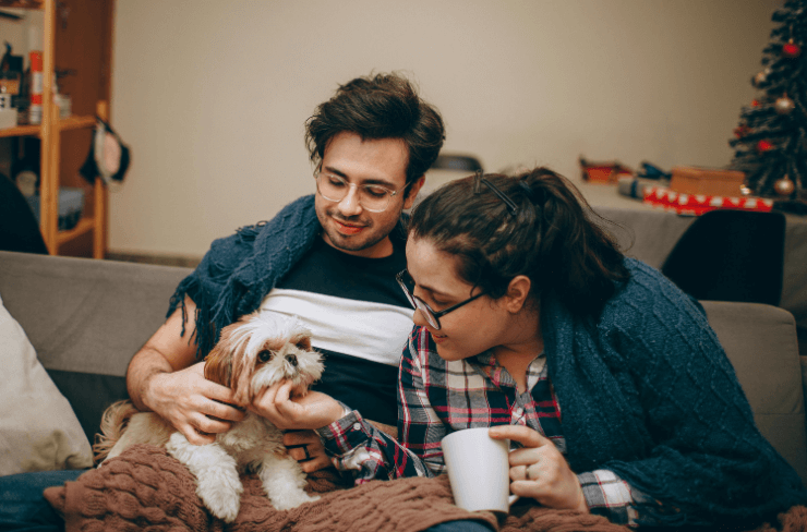 guy and woman with dog